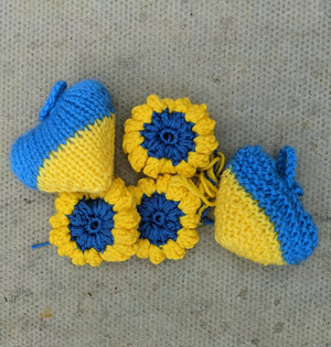 Blue and Yellow Sunflowers and Hearts made by The Higgins Knitting and Crochet Group © The Higgins Bedford Blue and Yellow Sunflowers and Hearts made by The Higgins Knitting and Crochet Group © The Higgins Bedford