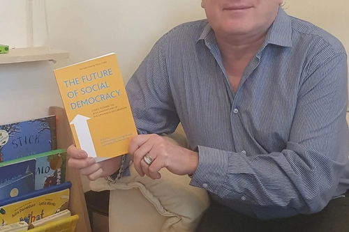 Cllr Tim Caswell with a copy of ‘The Future of Social Democracy’