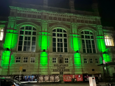 Image courtesy of Bedford Borough Council Corn Exchange lit green for Love Parks Week