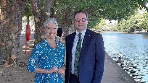 Henry Vann and Daisy Cooper MP by the Embankment