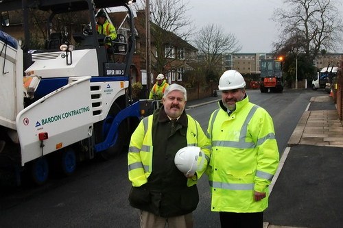 Mayor Dave Hodgson and Charlie Royden with road machine