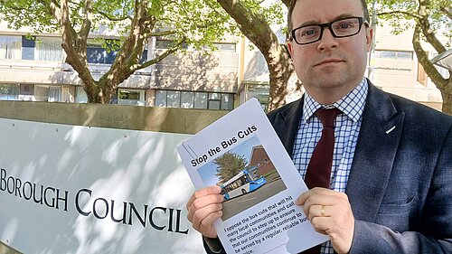 Henry Vann handing in a petition to Bedford Borough Council